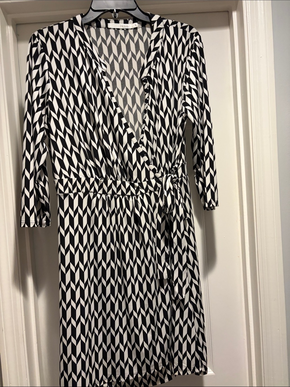 Black faux wrap and White Geometric Wrap Midi Dress